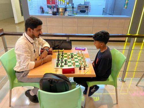 Kian from California US playing Chess with Coach Vedant